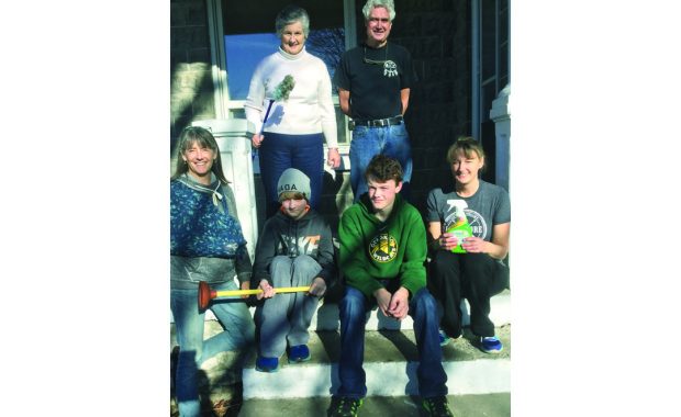 Some of the volunteers helping Valley Welcome prepare a house for Syrian refugees. Back row, left to right: Joan Phillips and Jim Murton. Front row: Elizabeth Freestone, Josh Good, Scott Good and Jane Good.