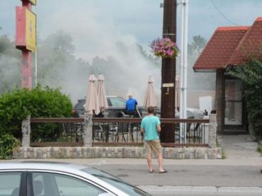 Unusual cause for car fire outside Dixie Lee