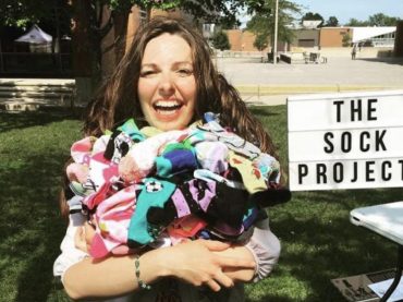 Ottawa teacher makes positive global change one pair of socks at a time